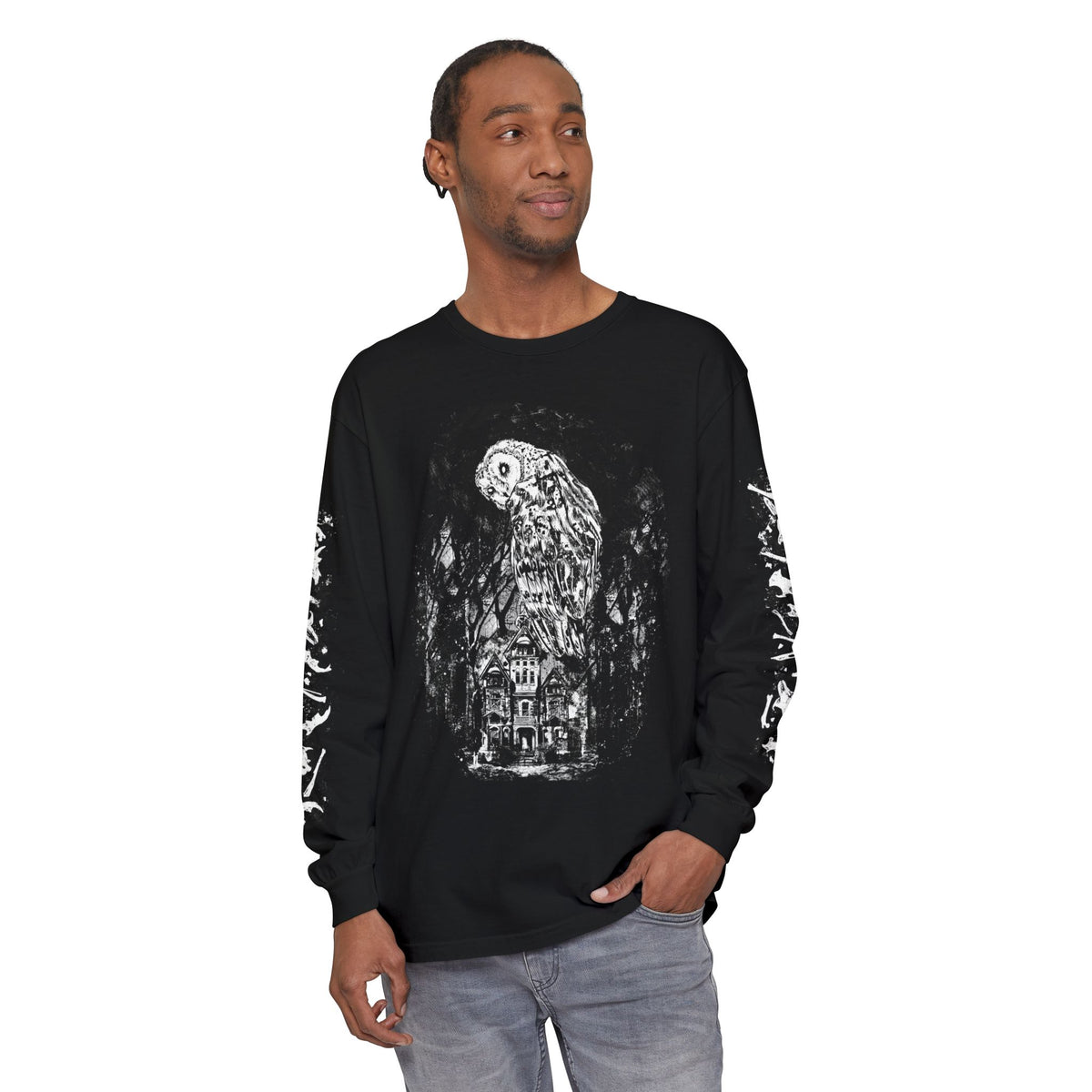 Man wearing a black long-sleeve shirt with a Barn Owl graphic 